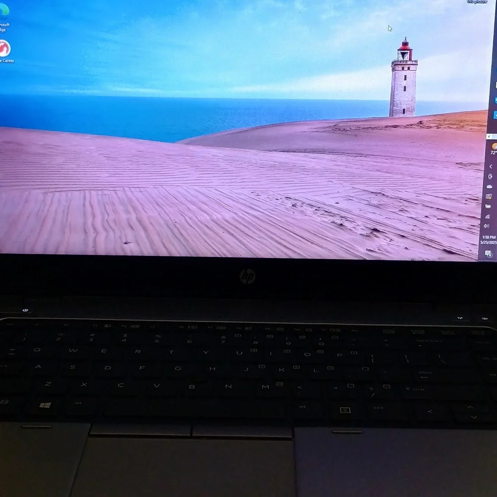 HP Laptop with Pink and Blue Display